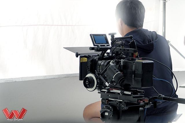 a person recording a corporate video production in singapore